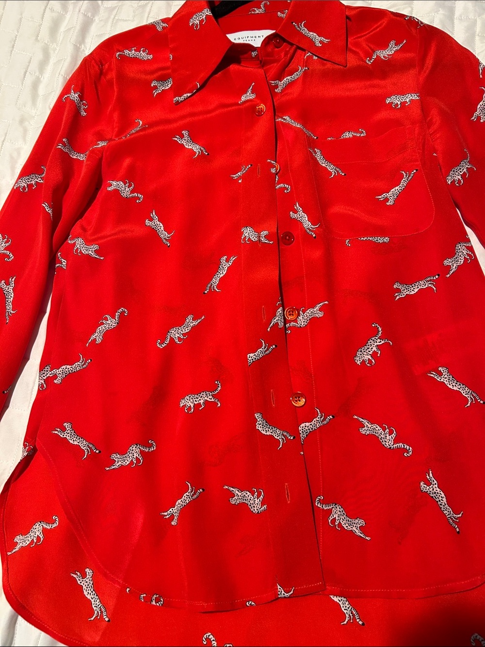 Women’s Leopard print silk top.